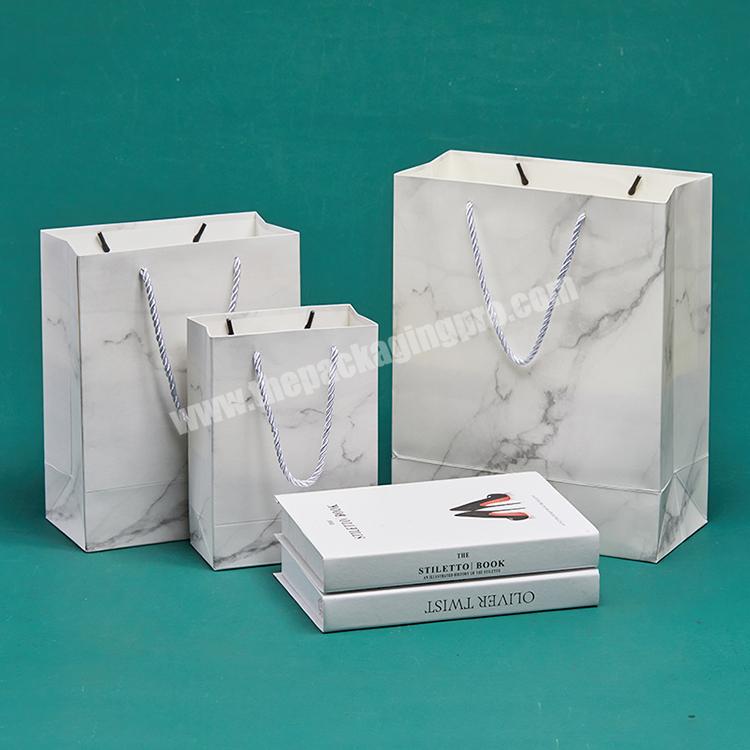 2023 Wholesale Custom Printed Logo Luxury White Paper Bag Retail Boutique Shopping Gift Paper Bags With Your Own Logo