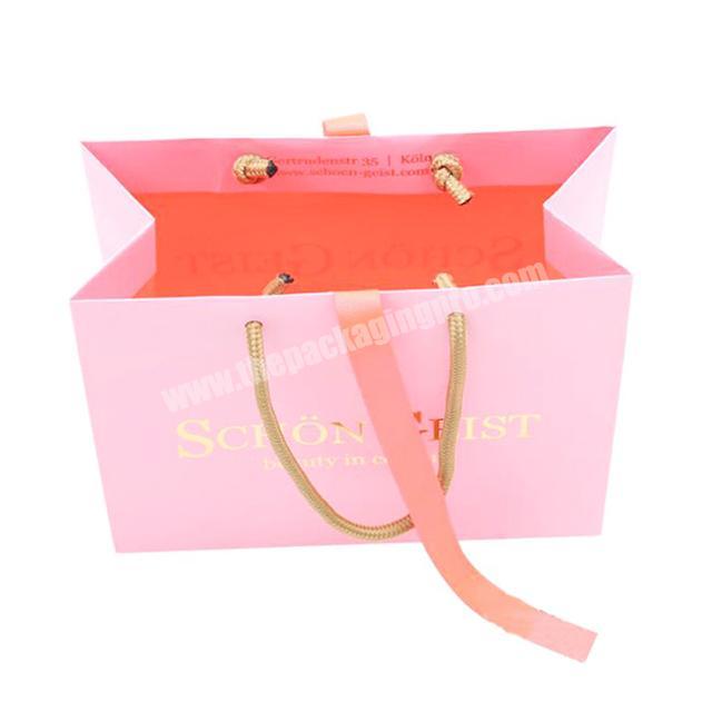 pretty design Factory Luxury Fashion Outlet OEM pink Gift Paper Bag with Silk Ribbon Handle for Woman