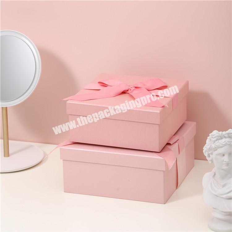 Custom logo wholesale manufacturer pink cardboard packaging gift box with ribbon
