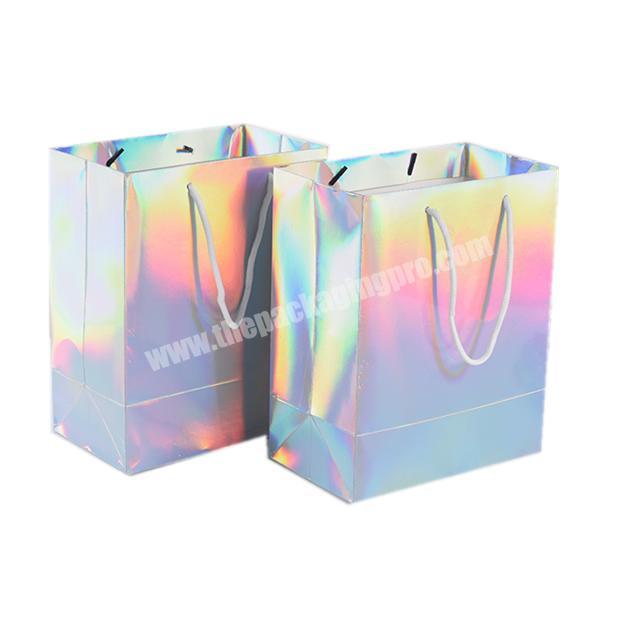 Customized High-end Pretty laser paper gift bag Free design own with your logo