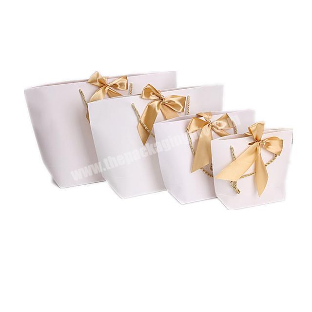Luxury White Gift Paper Bag Custom Made Printed Logo Jewelry Packaging Candy Paper Bag With Bowknot