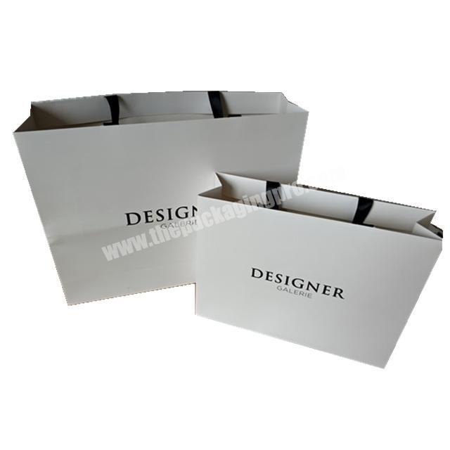 Custom Design Free Logo High-end specialty paper white shopping paper bag for clothes