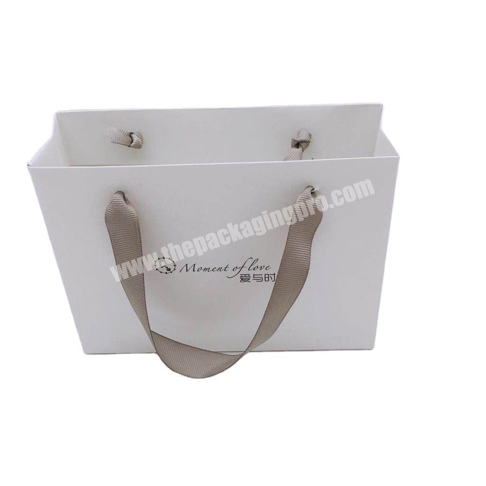 Wholesale  cheap white card paper bag with logo customized and ribbon handle, Jewelry box packaging bag