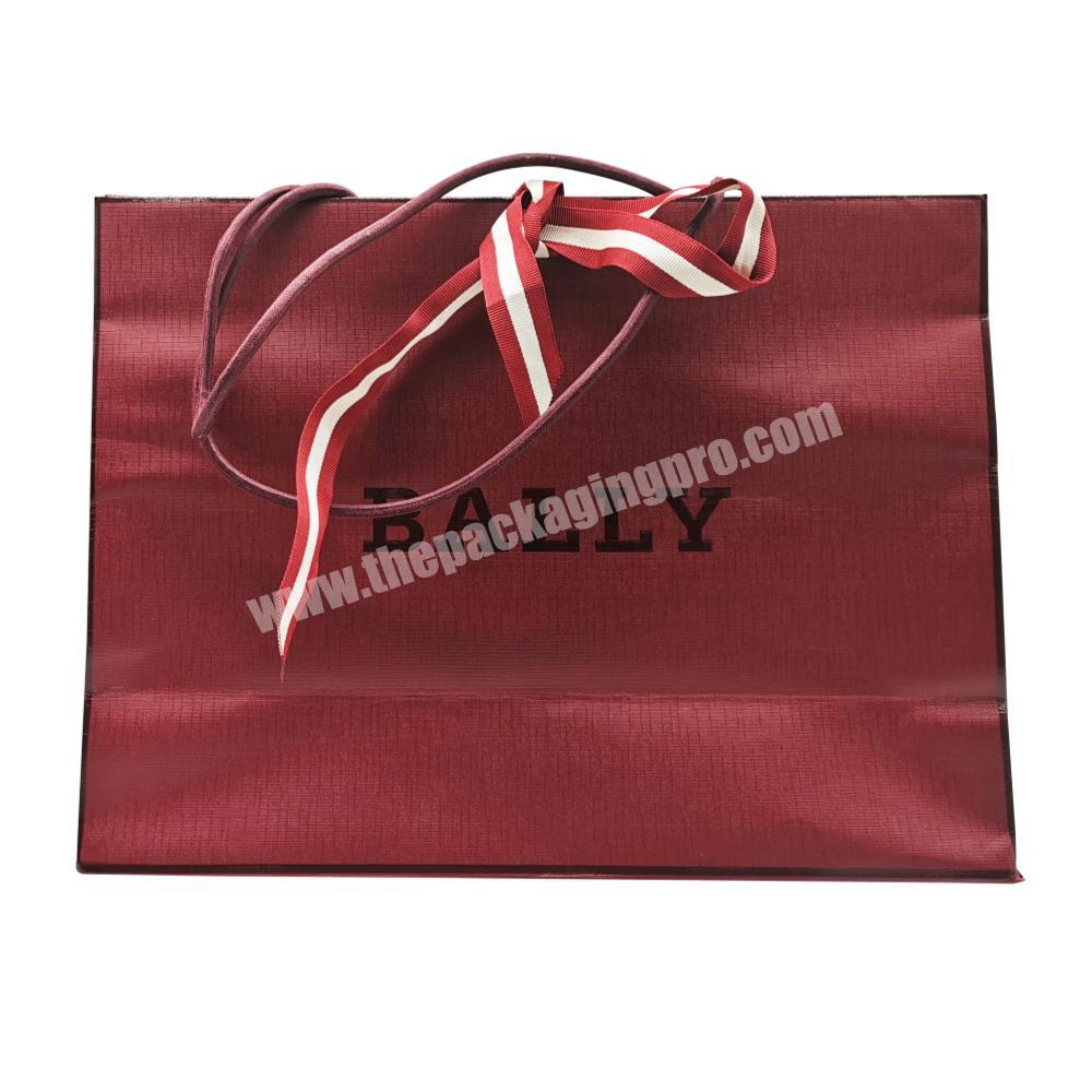 High End Disposable Paper Carry Shopping Bag With Strings And Ribbons