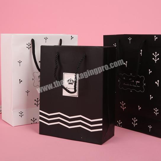 RTS cheap women's clothing packaging paper shopping bags  with handles