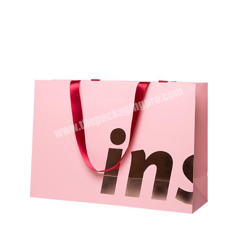 Fashion fancy pink clothing shopping bag thickened custom logo gifts high-end packaging paper bags