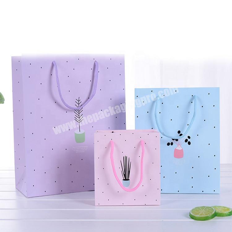 China manufactures customized pink lining bag gift paper