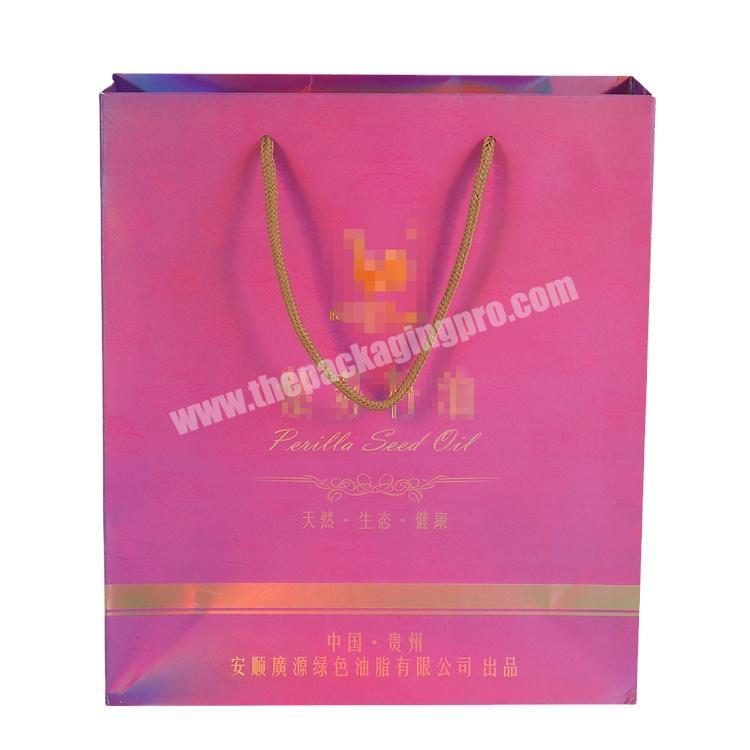 Wholesale reusable Small Pink Jewellery Promotion Paper Bag For Clothes with high quality