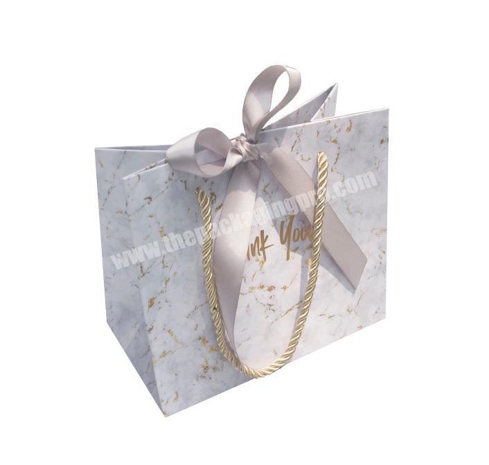 Elegent luxury gift bag small cosmetic private label eyelashes custom marble paper bag with ribbon bow