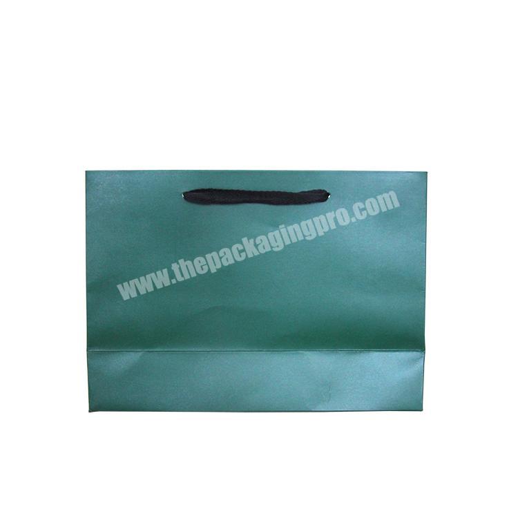 Offset printing paper material and hand length handle sealing & handle flat handle kraft retail shopping gift paper bag