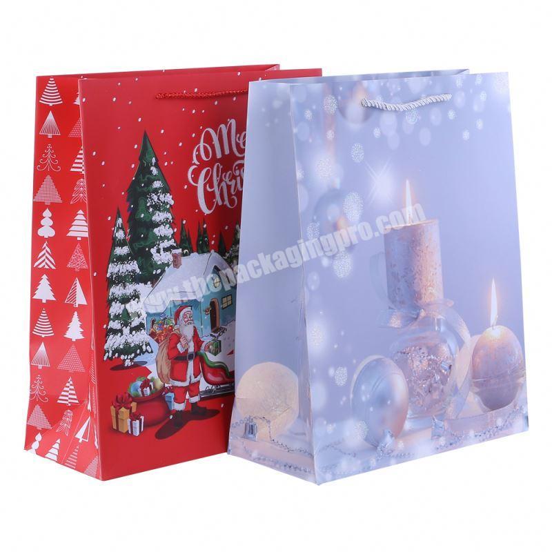 Trendy style christmas gift paper bag with handle exquisite decoration handmade paper bag