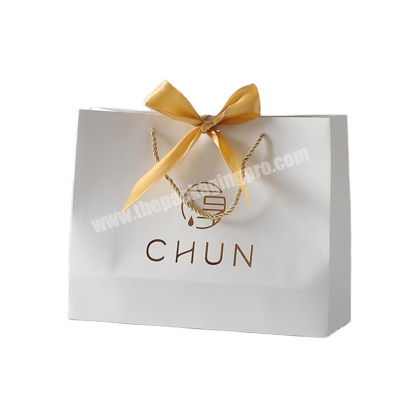 China well made customized ribbon handle stand up white paper bag with logo printing