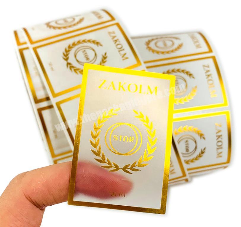 Custom Printing Transparent Roll Logo Labels Clear Waterproof Gold Foil  Vinyl Self Adhesive Labels