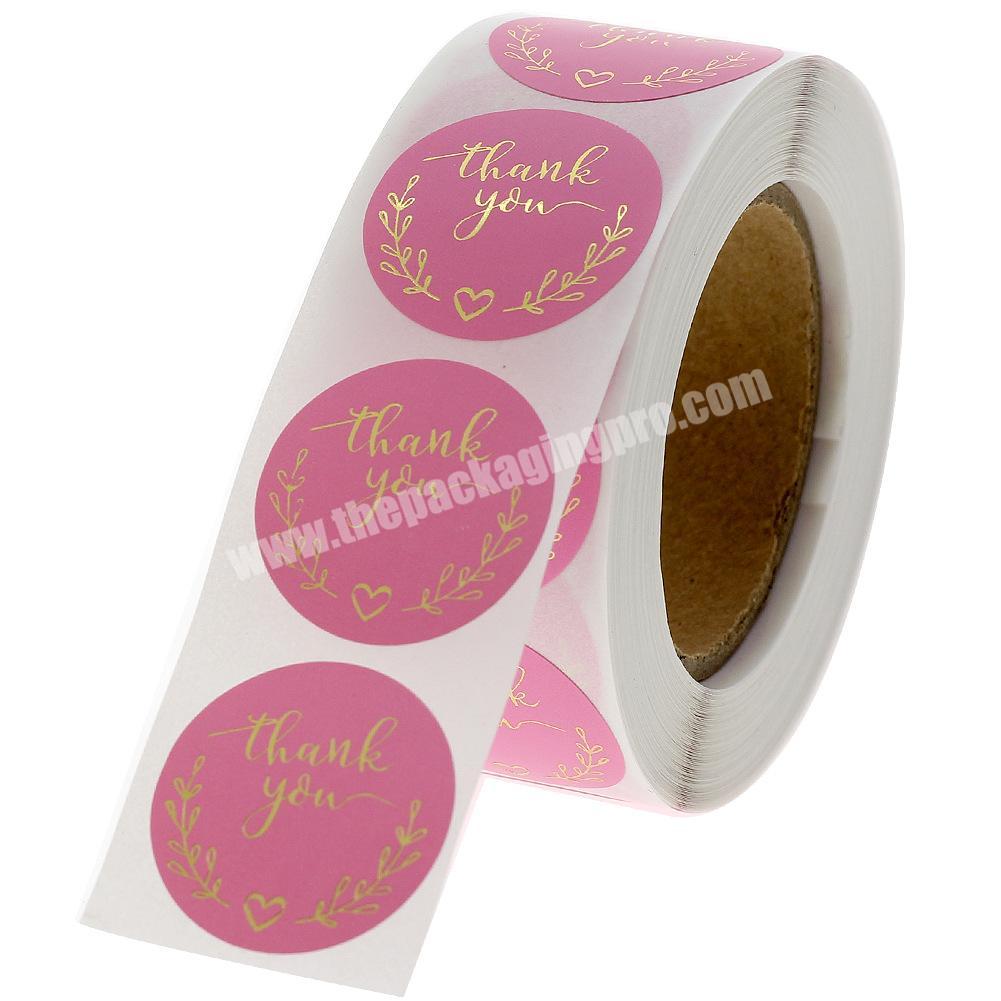 https://thepackagingpro.com/media/goods/images/2021/8/Custom-Round-Page-Clear-Transparent-Self-Adhesive-Printing-Rose-Gold-Foil-Vinyl-Sticker-Logo-Packaging-Label-Roll-4.jpg