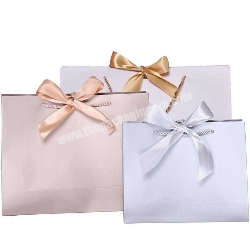 Custom design cheap cute fancy paper christmas gift bags for packaging items