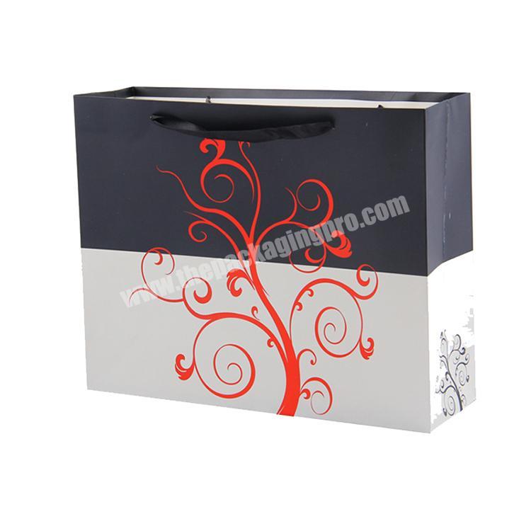 Custom manufactures reusable custom retail luxury logo Printed cardboard boutique shopping paper gift bags