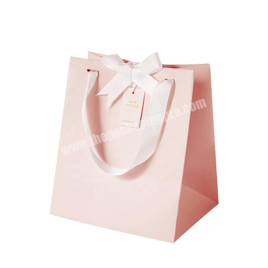 Custom small pink merchandise paper bags for gift