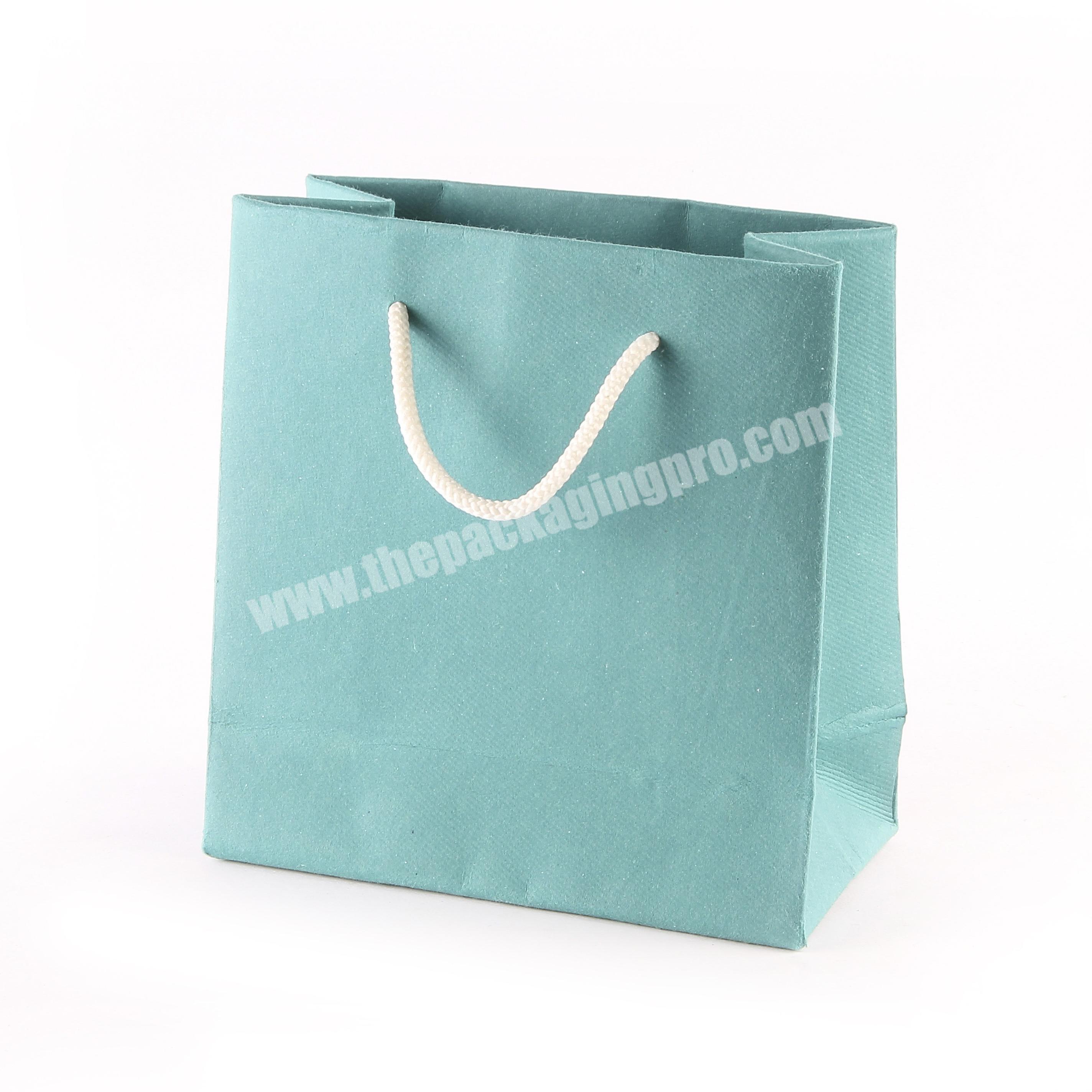 Custom unique design colour printing commercial luxury shopping gift paper bag