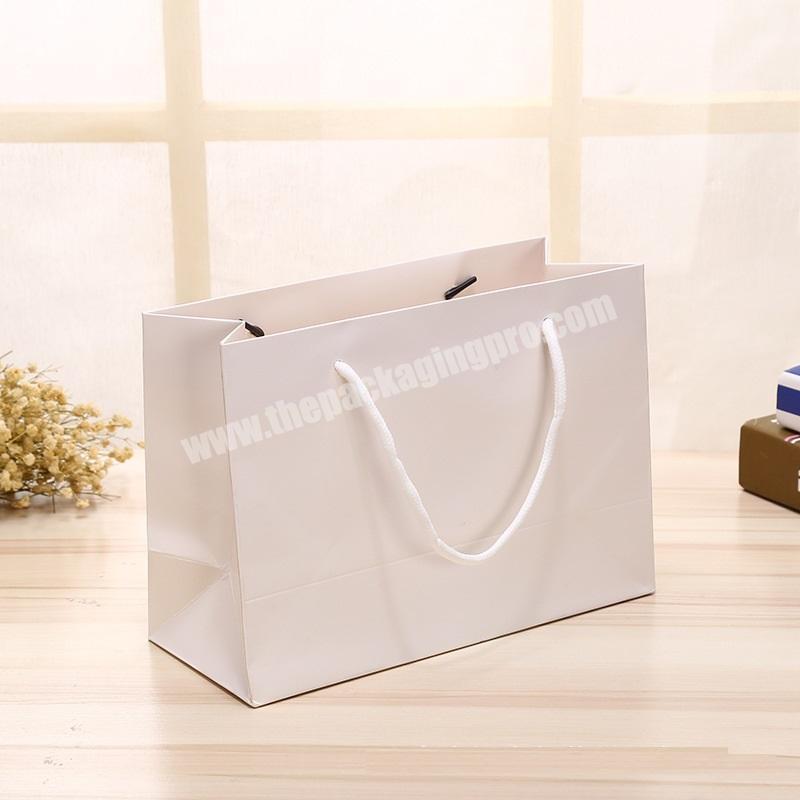 Factory Price Custom Printed Kraft Paper Shopping Bag with Logo Paper Gift Bag