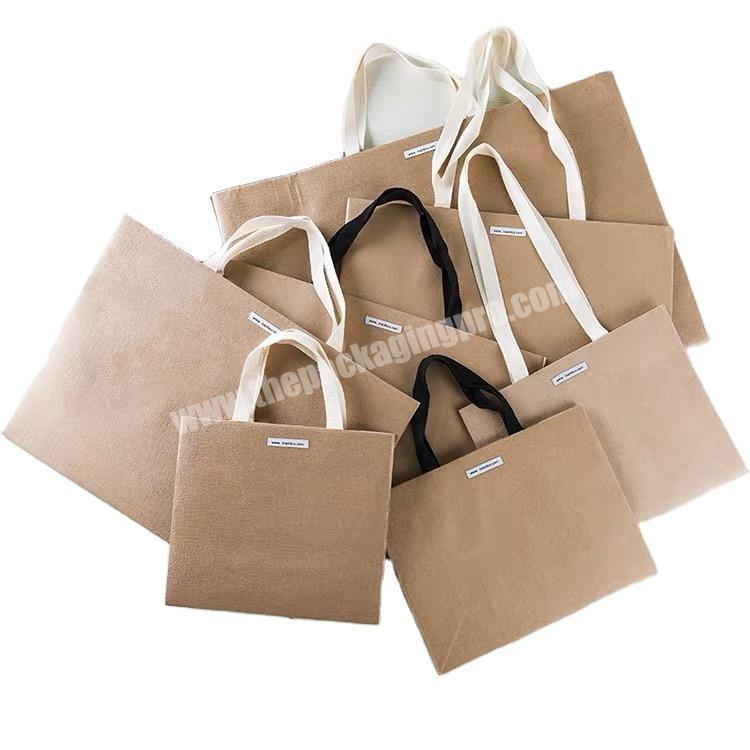 Factory price custom kraft paper bag for clothes shopping carry bags wholesales