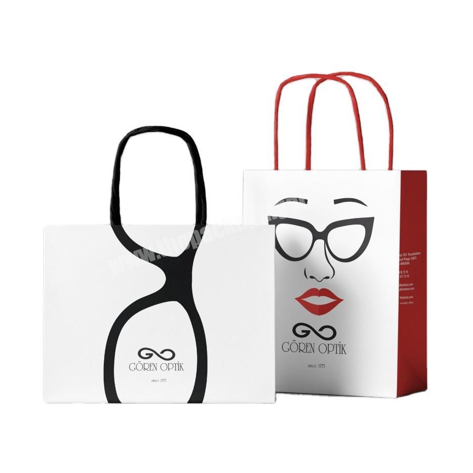 Hot selling customized pattern kraft paper glasses eyeglasses packaging bag for optical shop