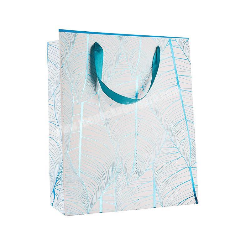 Premium Foil Stamped Durable  Unique Design Blue Paper Gift Bags China online with Ribbon Handle