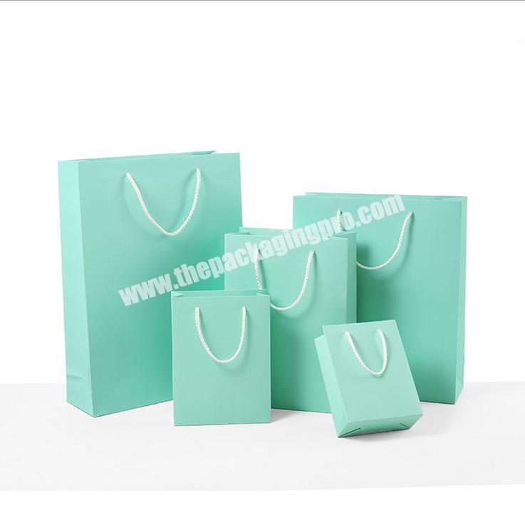 Wholesale colorful customized printed shopping paper bags with handles