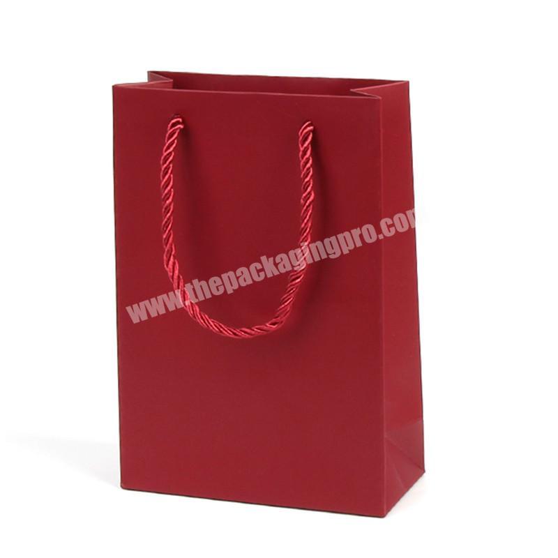 Wholesale custom paper bag luxury packaging paper bags with your own logo