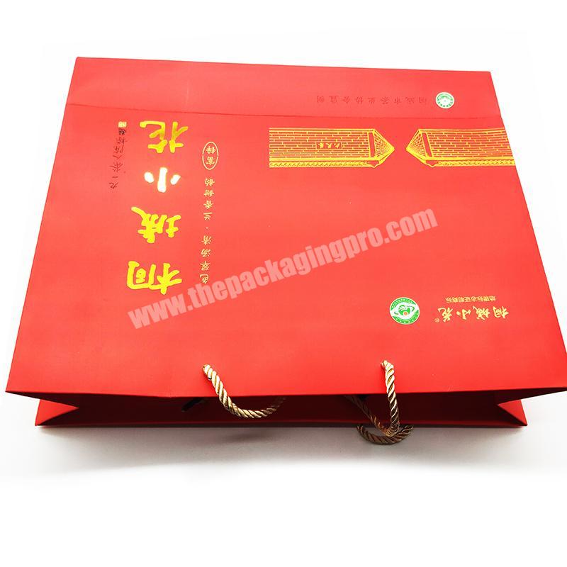 Wholesale custom printed full colors luxury shopping gift paper bag with handle