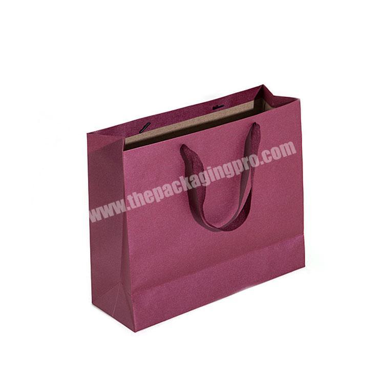 Wholesale custom printed luxury shopping gift paper bag manufacturers with handles