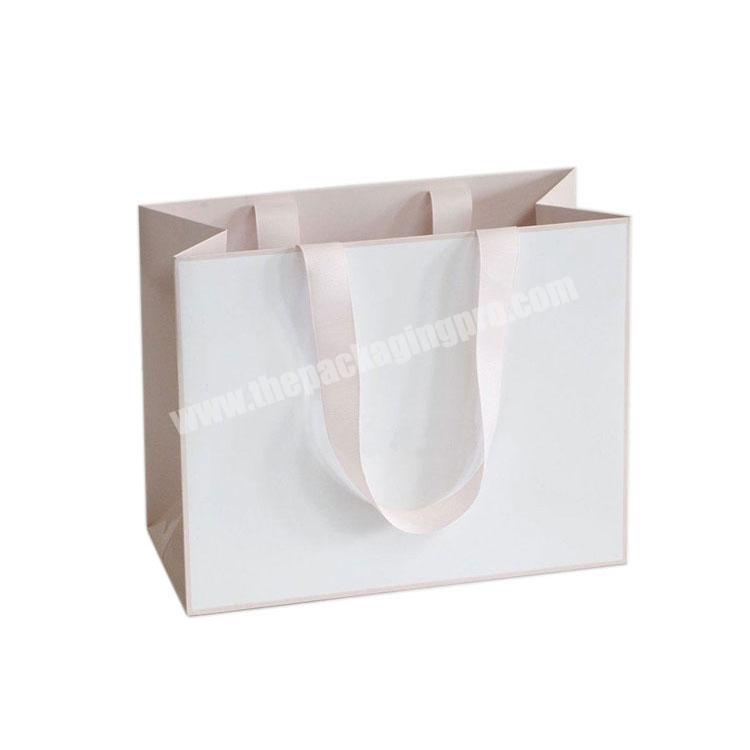 Wholesale custom printed your own logo packaging white paper gift shopping bag