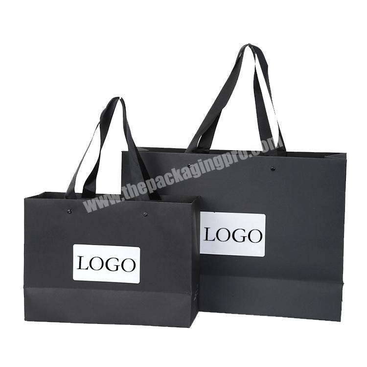 Wholesale luxury famous brand custom logo printed packaging shopping paper bag
