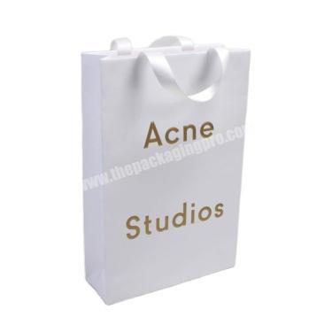 Wholesales custom white paper bag with your logo custom cardboard shopping paper bag with ribbon handle