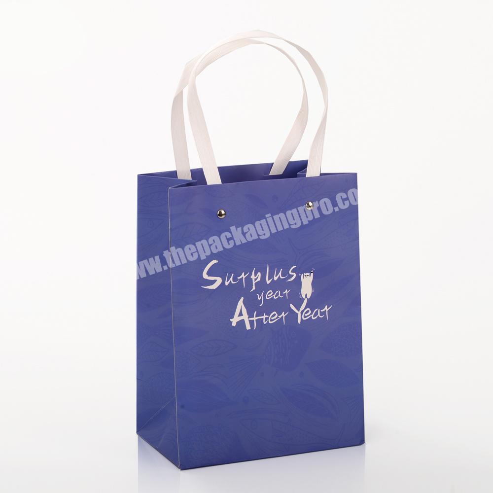 Wholesales paper bag packaging shopping bag Ivory paper bag with paper handle