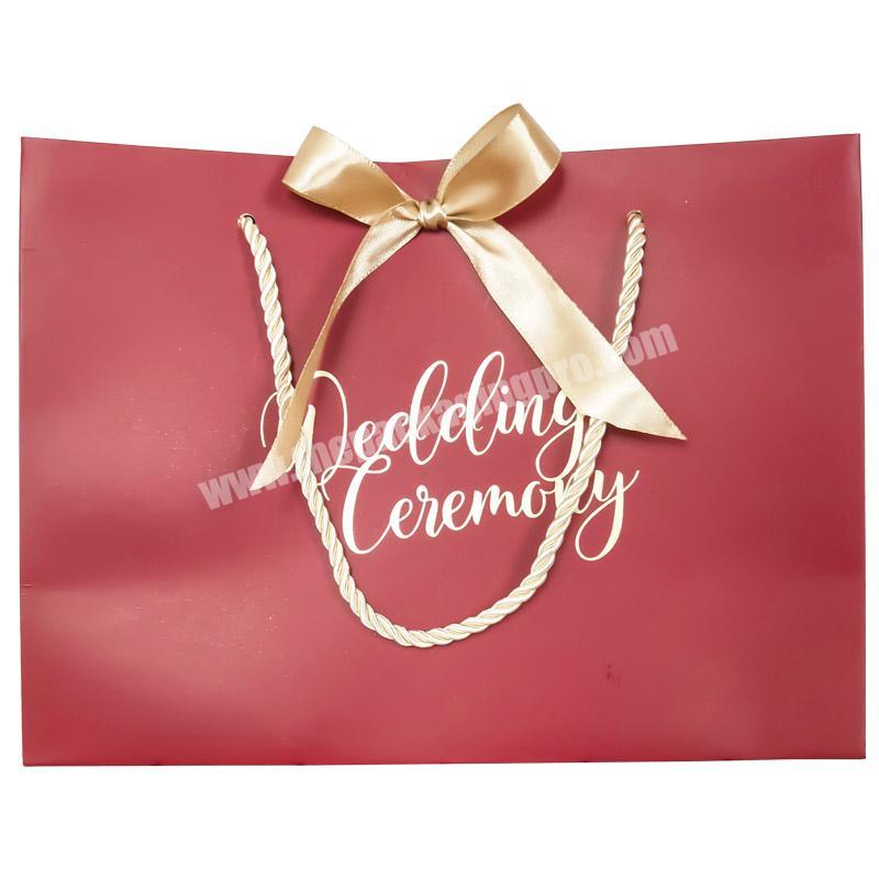 fancy red Christmas gift packaging wedding chocolate paper bag with ribbon bow