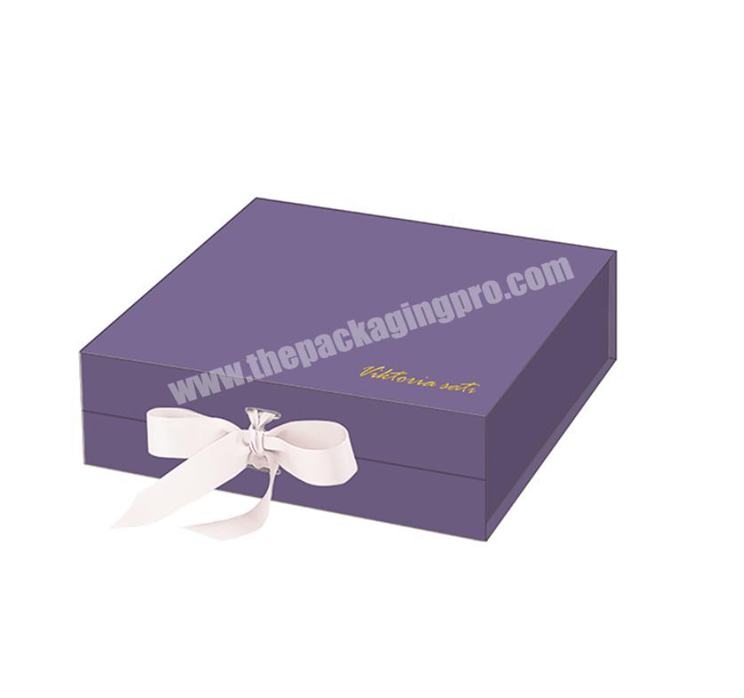luxury logo embossing customized retail clothing paper packaging box