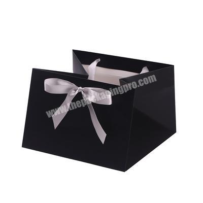 wholesale fancy custom cardboard paper cosmetic carry bag with ribbon handles