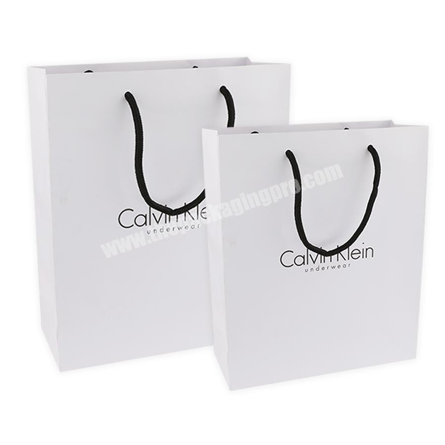Custom logo printed bag  Luxury Red Custom Paper Shopping Bags Logo Printed Foldable Reusable