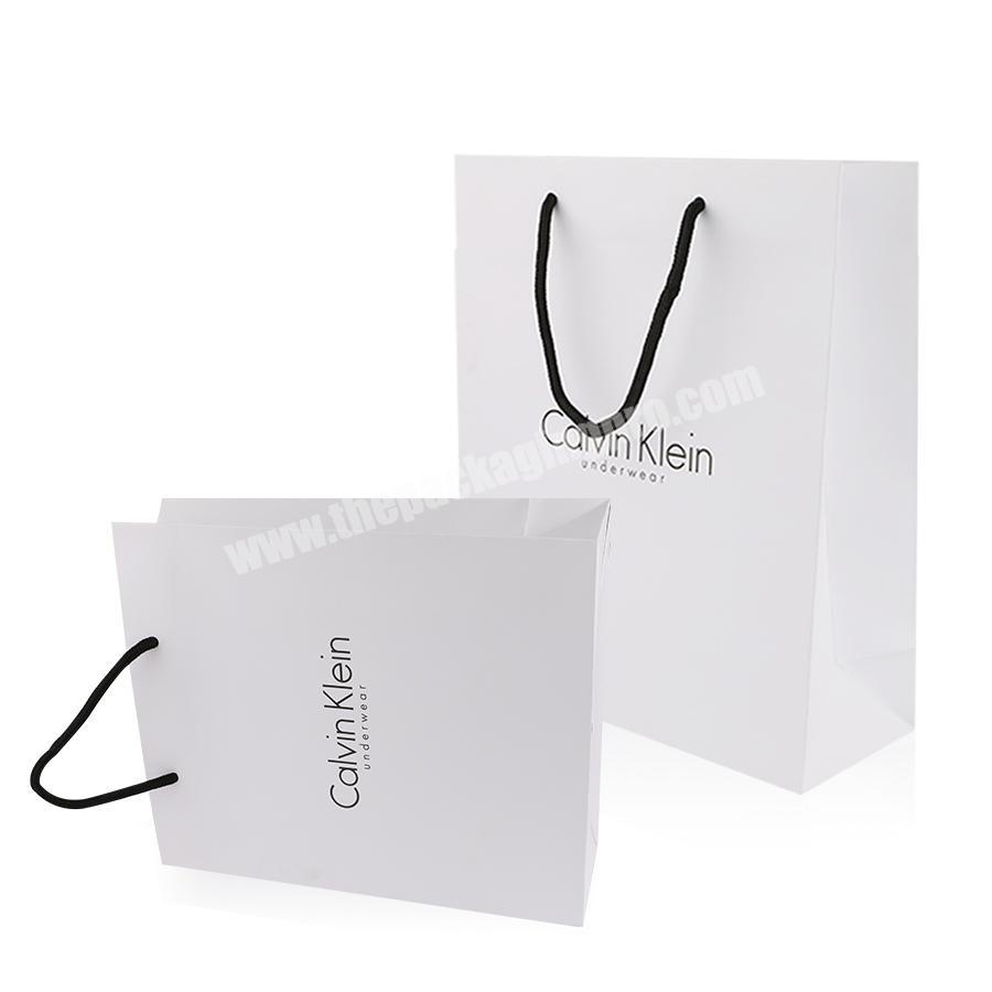 Luxury customization paper bag white color Cheap Washable Custom Printed Luxury Gift Paper Shipping Bag Brown With Handle