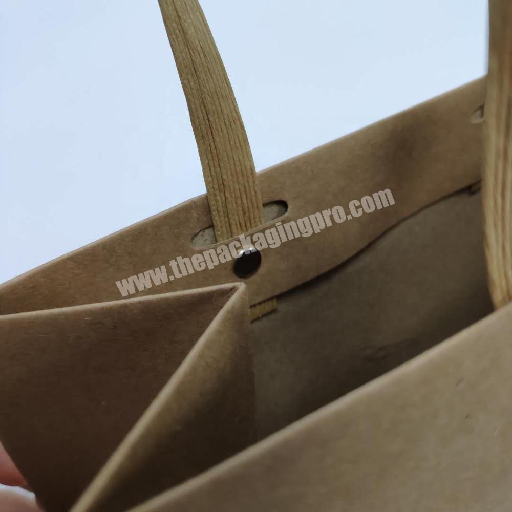 Brown kraft paper bag with green foil logo and paper cord handle factory