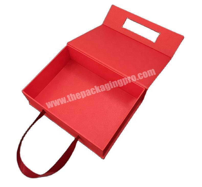 Magnetic rigid red packing box with ribbon handle for shoes and clothing