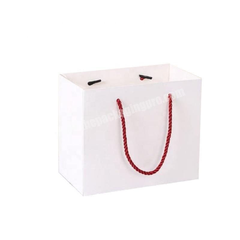 Cheap oem hot stamping customized logo eco friendly foldable clothes white paper gift bag with handle