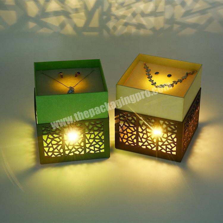 Classically designed square hollow-out cardboard with laser-cut LED light jewelry necklace box