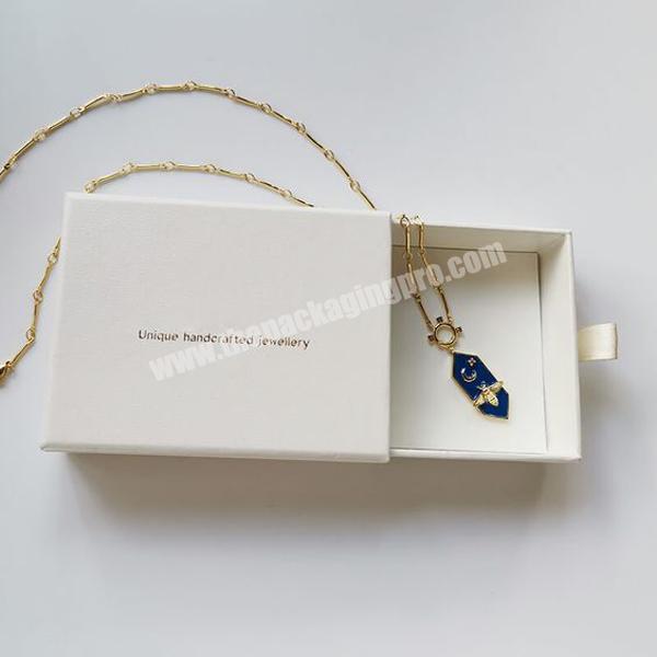 Custom drawer unique jewelry gift packaging box beige color logo foil print necklace rings bracelet sponge insert gift box