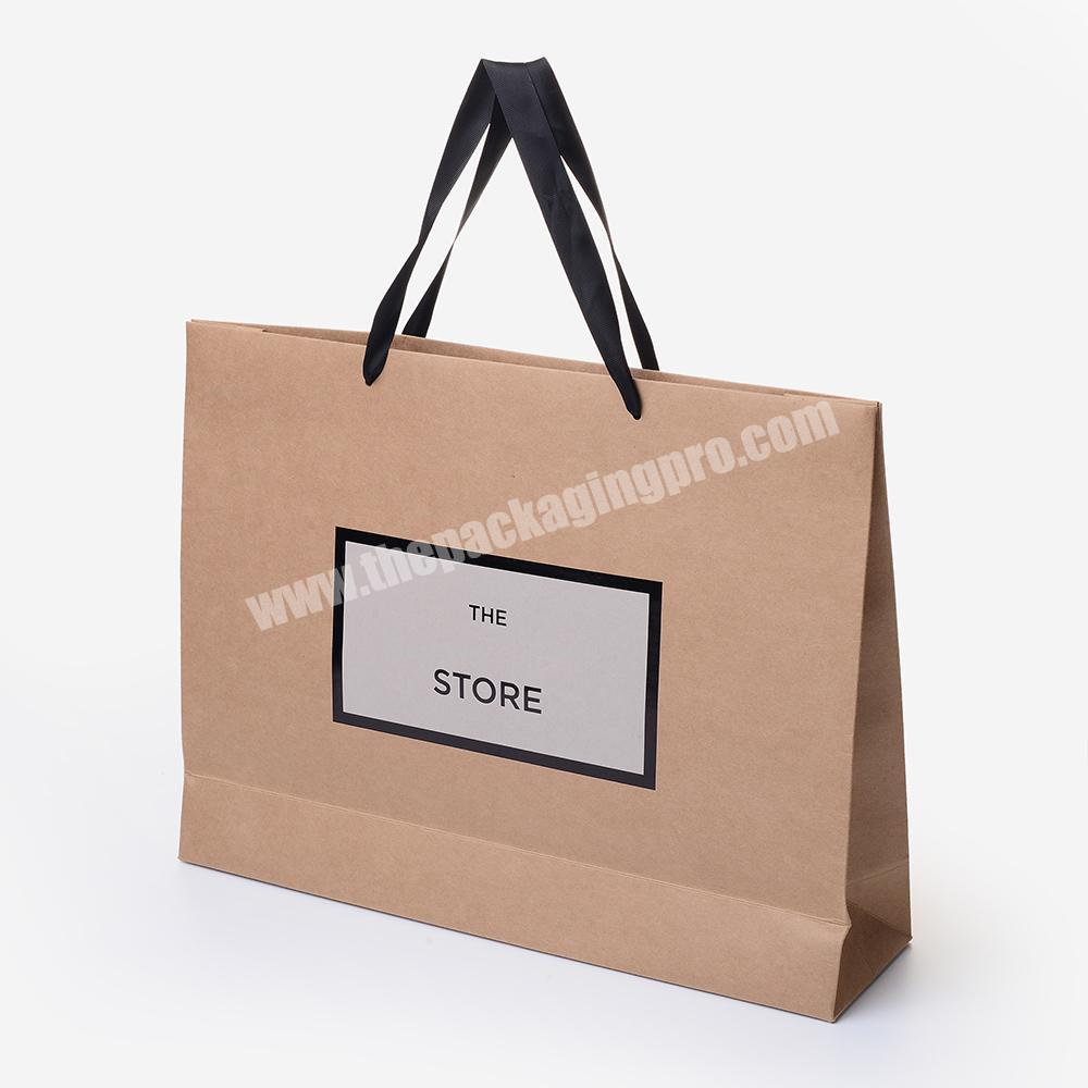 Customized Kraft Paper Bag Exquisite UV Hot Stamping Foil Portable Custom Packaging Bag