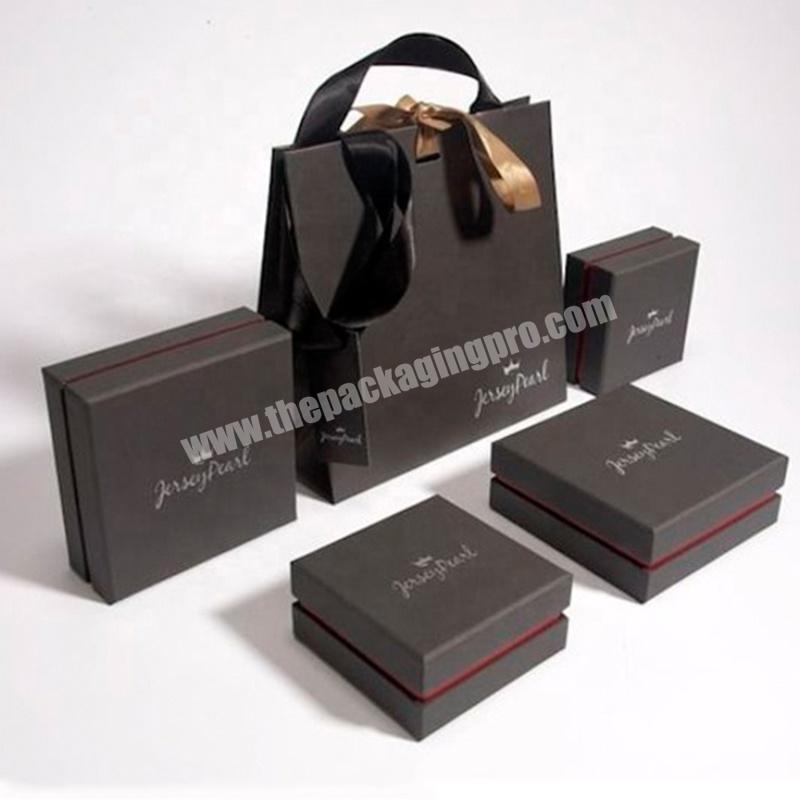 Luxury eco friendly custom UV coating logo hot stamping gift packaging cardboard bag paper shopping with handle