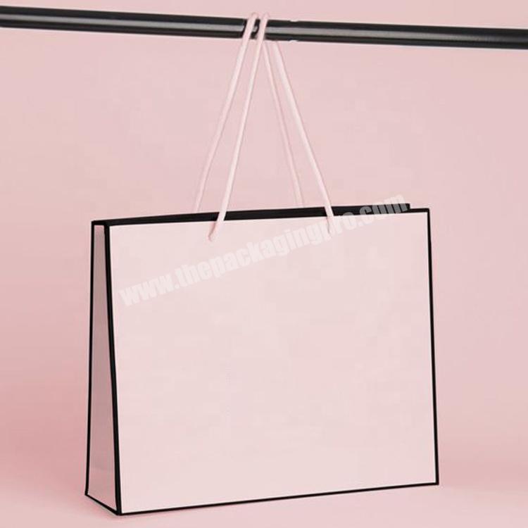 Luxury eco friendly hot stamping fancy glossy custom logo printed pink paper bag gift paper bag eco shopping bag with handle