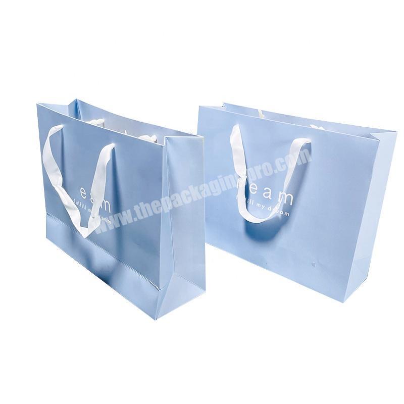 wholesale custom printed blue luxury shopping paper bags with handles packaging with your own logo