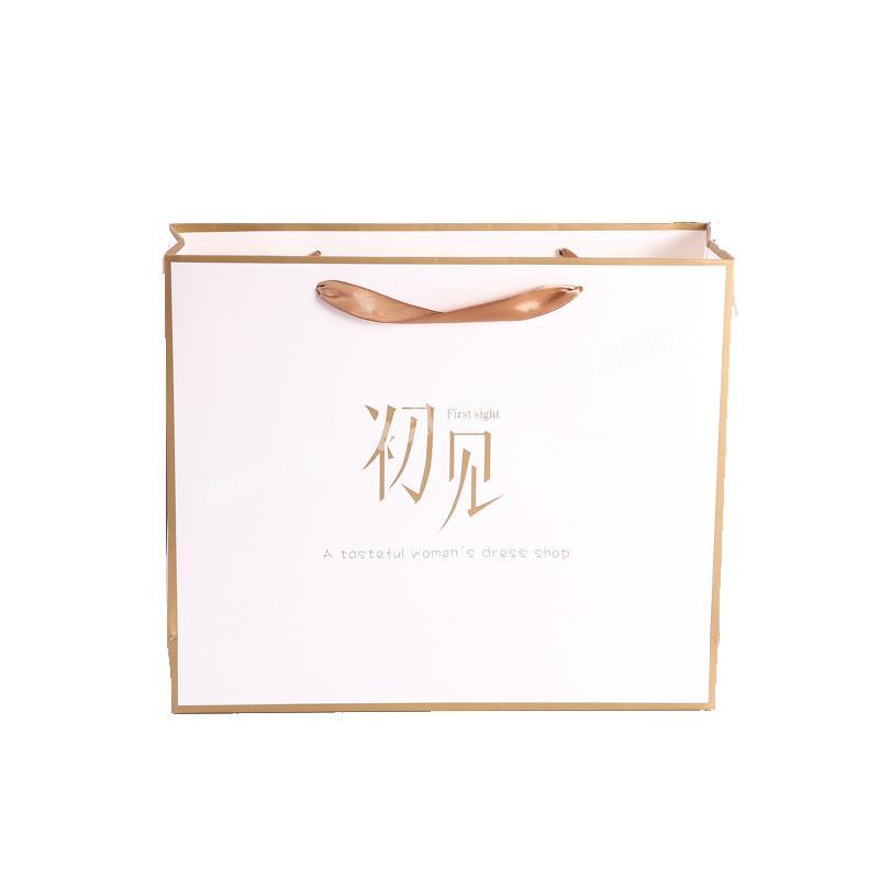 China wholesale custom paper bag white packaging paper bags for clothes