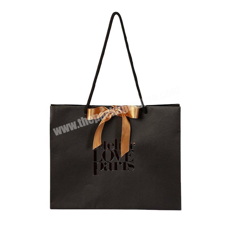 China wholesale luxury black paper bag with ribbon
